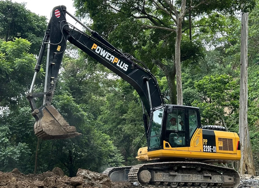 powerplus PP220E-XI crawler tracked excavator in a forest in latin america